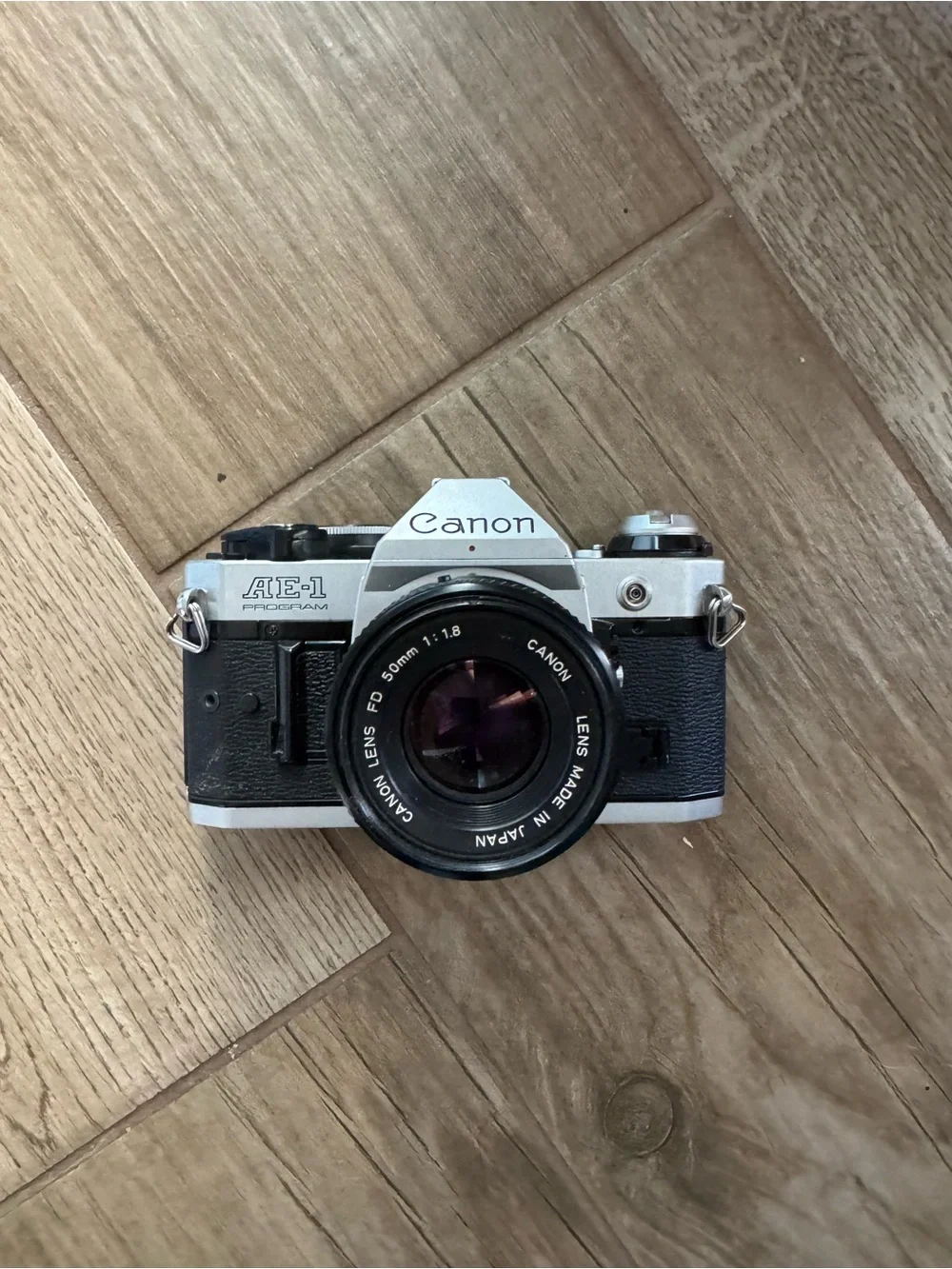 Canon AE-1 Program Film Camera in Black and Silver